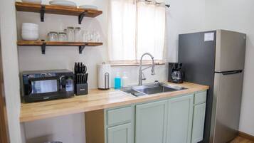 Fridge, microwave, stovetop, coffee/tea maker