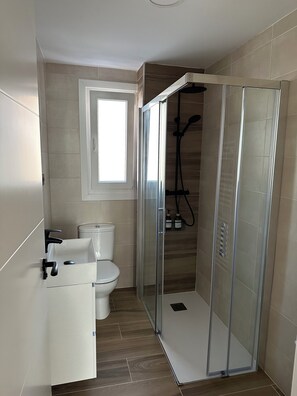 Hair dryer, towels, soap, toilet paper