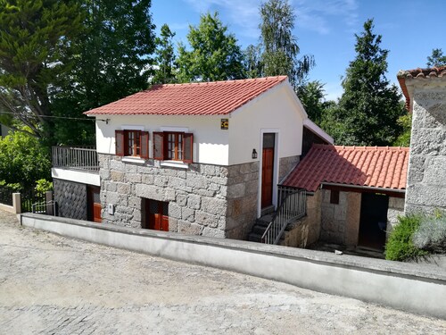 A cozy rustic house with essential services 25 meters away. 