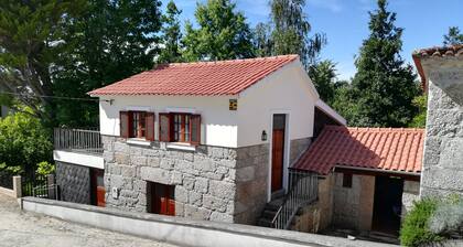 A cozy rustic house with essential services 25 meters away.