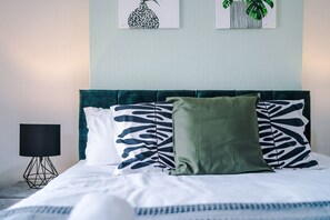 2 dormitorios, tabla de planchar con plancha, wifi gratis y ropa de cama