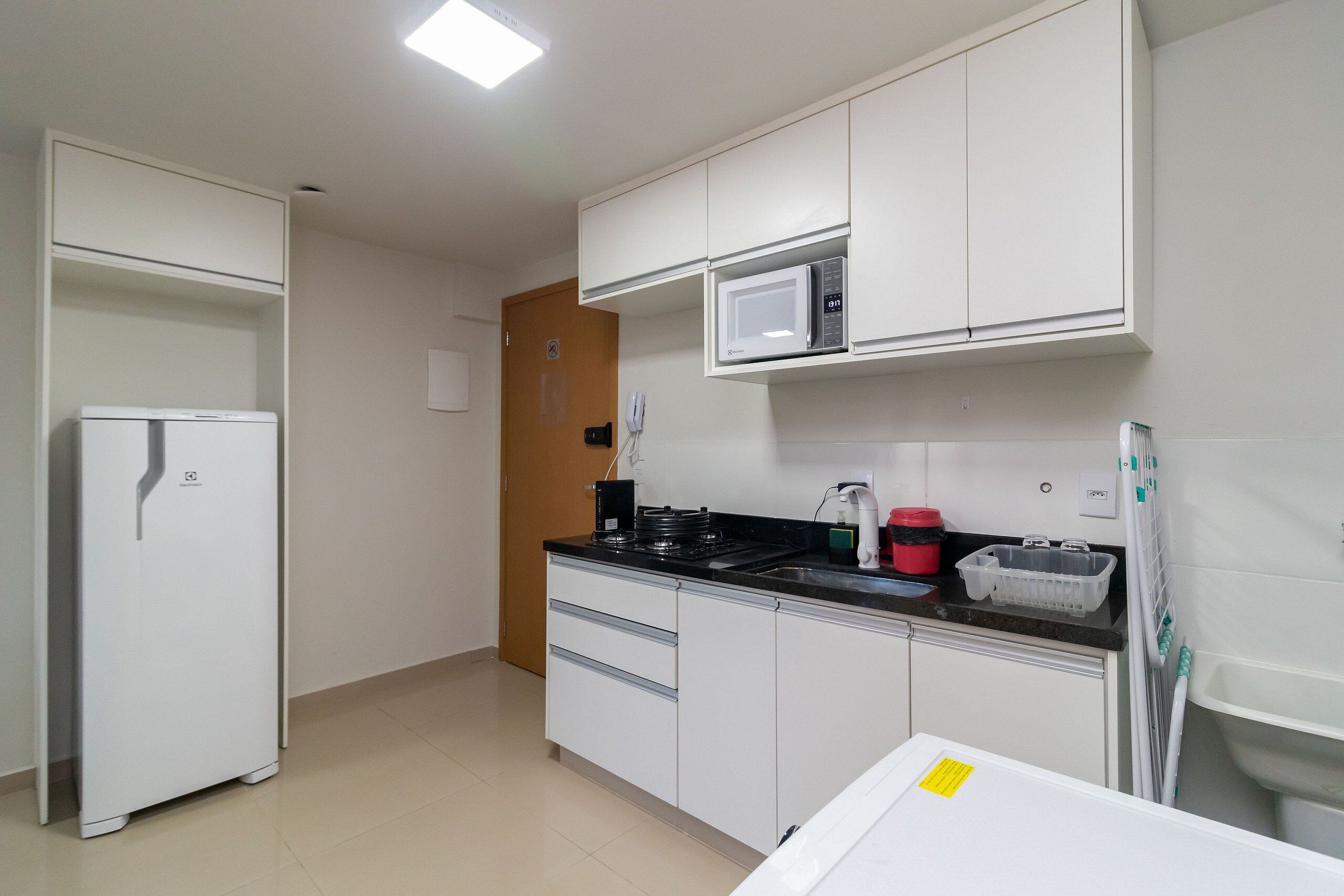 Apartamento | Cozinha privada | Talheres/pratos/utensílios de cozinha