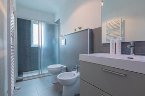 Apartment, Balcony | Bathroom | Shower, hair dryer, bidet, towels - Appartamento Re Umberto by Wonderful Italy (Turin)