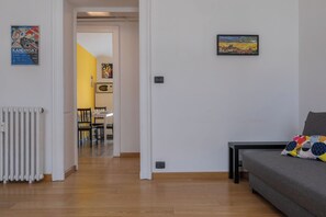 Apartment, Balcony | Living area | 35-inch TV with digital channels - Appartamento Re Umberto by Wonderful Italy (Turin)