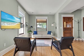 Smart TV, fireplace - "Charming 4BR Home Steps to Lake of the Isles with Fenced Yard & Deck" (Minneapolis)