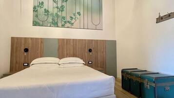 Camera Junior, vista giardino | Copriletto in piuma, minibar, una cassaforte in camera, una scrivania