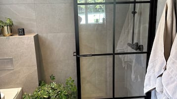 Hair dryer, towels, soap, shampoo