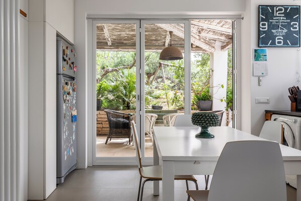 Villa, Garden View | Living area | 35-inch TV with digital channels