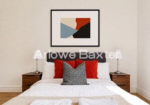 1 bedroom, desk, iron/ironing board, travel crib