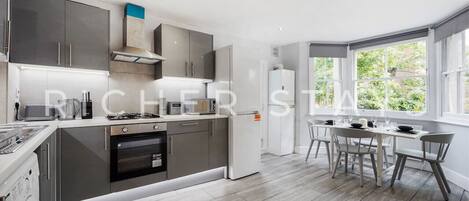 Fridge, microwave, oven, coffee/tea maker