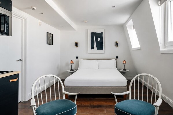 1 habitación, tabla de planchar con plancha, wifi y ropa de cama 