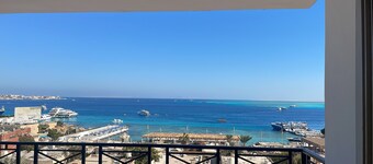 Sea view  3-bedroom apartment in delightful hurghada , 
 with AC, WiFi