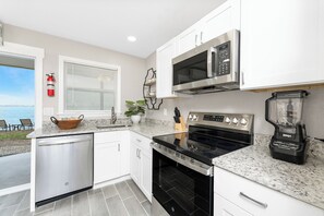 Fridge, microwave, dishwasher, coffee/tea maker
