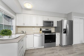 Fridge, microwave, dishwasher, coffee/tea maker