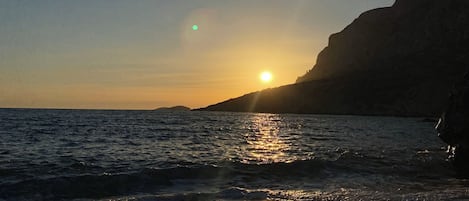 På stranden och strandhanddukar