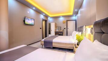 1 غرفة نوم وأغطية فراش متميزة وميني بار وتجهيزات عازلة للصوت