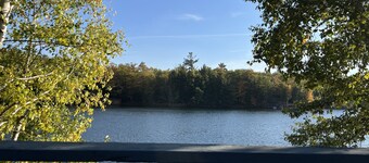 Gorgeous lakefront home with dock, sandy beach area, fireplace, huge deck & WIFI