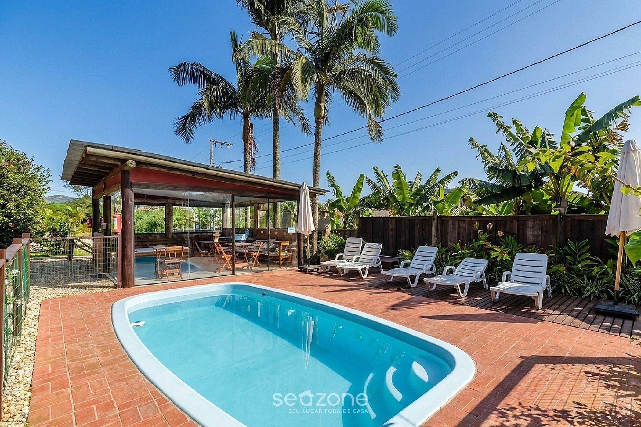 Basic Apartment | Pool | Outdoor pool, pool umbrellas, sun loungers