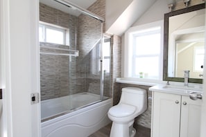 Hair dryer, towels, soap, shampoo