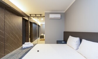 Tabla de planchar con plancha, wifi gratis y ropa de cama 