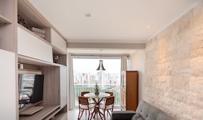 Apartment | Living area | Smart TV - WBU - Studios Modernos no Setor Bueno (Goiânia)