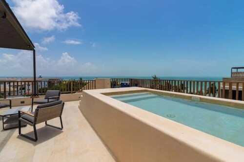 Pool view loft steps away from the beach - B102

