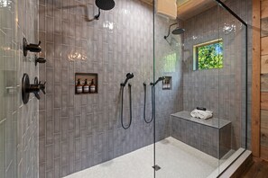 Shower, hair dryer, towels, shampoo