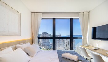 Apartamento básico | Tabla de planchar con plancha, wifi gratis, ropa de cama