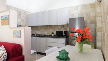 Apartment, City View | In-room dining