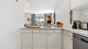 Fridge, microwave, dishwasher, coffee/tea maker