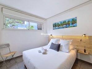 2 dormitorios, tabla de planchar con plancha, wifi gratis y ropa de cama