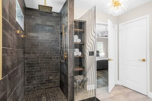 Shower, hair dryer, towels, soap