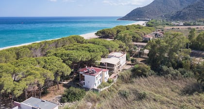 Holiday Home 'Su Entu A Mari Museddu' with Sea View, Shared Garden and Wi-Fi