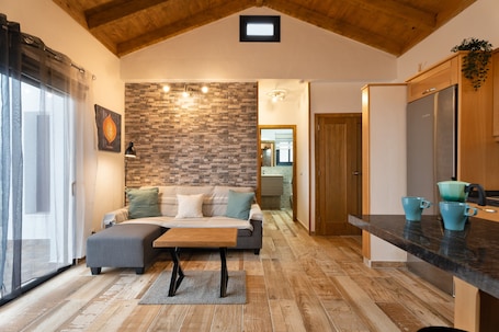 TV, fireplace. Holiday Home 'Los Almendr2s' with Sea View, Private Terrace and Wi-Fi