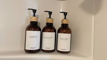 Hair dryer, towels, soap, shampoo