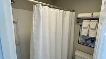 Hair dryer, towels, soap, shampoo