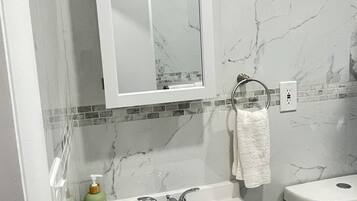 Hair dryer, towels, soap, toilet paper