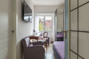 3 habitaciones, tabla de planchar con plancha, wifi y ropa de cama 