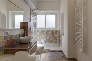 Shower, jetted tub, hair dryer, bidet