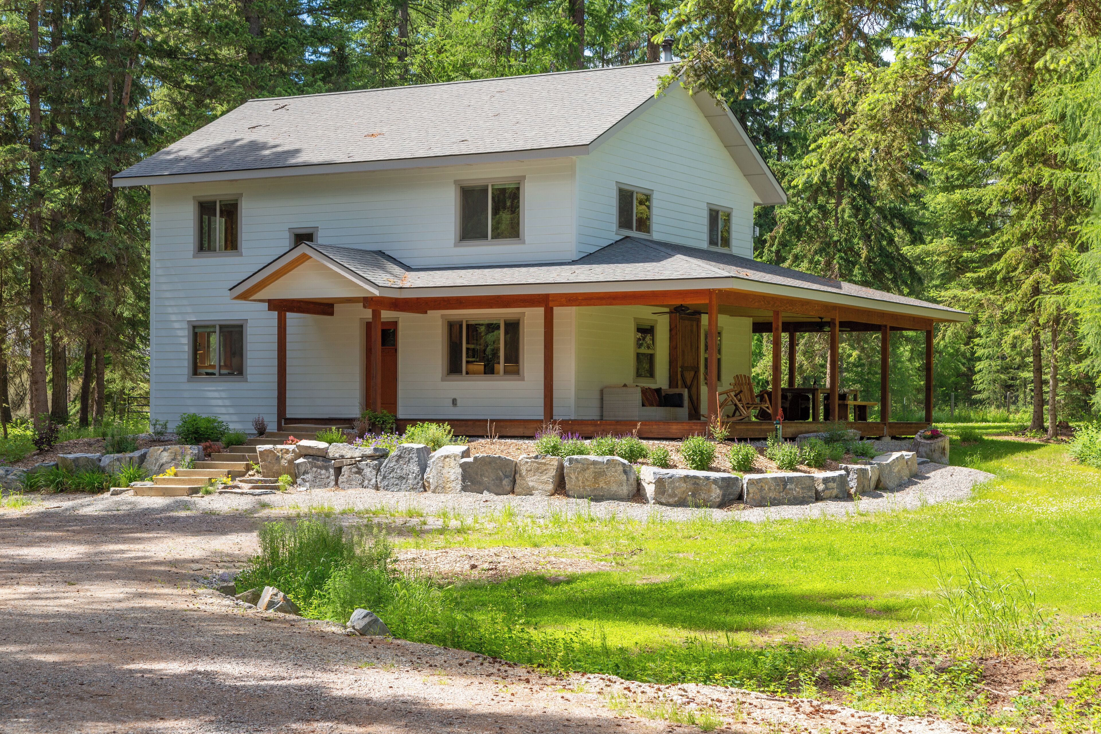 A Whitefish Legacy Estate- Nestled in the trees 4BR + Nearby to Dining and Shopping!