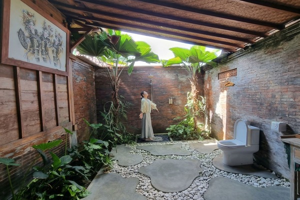 Cabaña Deluxe, balcón, vista al jardín | Baño