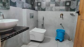 Shower, rainfall showerhead, towels, soap