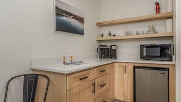 Microwave, coffee/tea maker, toaster, cookware/dishes/utensils