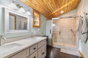 Shower, towels, soap, toilet paper