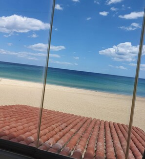 On the beach, sun loungers