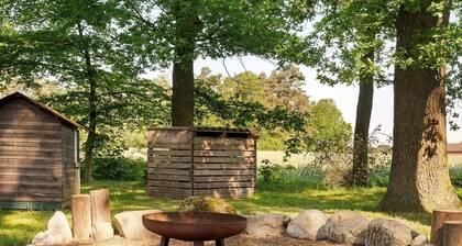 Holiday Apartment "Eichengeflüster Schwalbenloft" with a Private Terrace under the Oaks