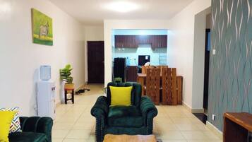 Family Apartment | Living area | 24-inch Smart TV with digital channels