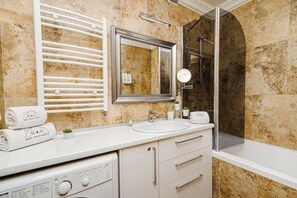 Hair dryer, towels, soap, shampoo
