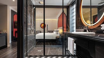 Superior Room, 1 King Bed, Non Smoking | Bathroom | Separate tub and shower, hydromassage showerhead, free toiletries