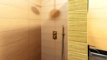 Shower, hair dryer, towels, shampoo